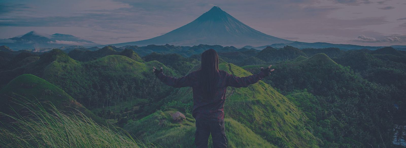 A traveller looking out over mountains